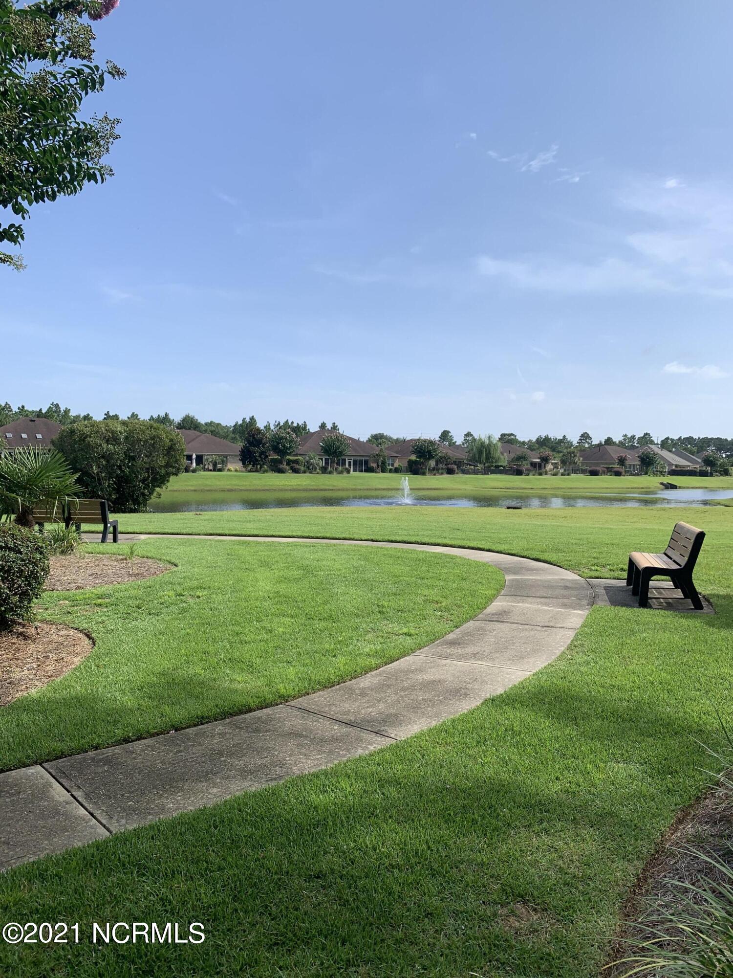 520 Motts Forest Road Wilmington, NC 28412 - Photo 14 of 15 Amenities include 2 clubhouses, 2 swimming pools, pickleball courts, tennis court, putting green and parks.