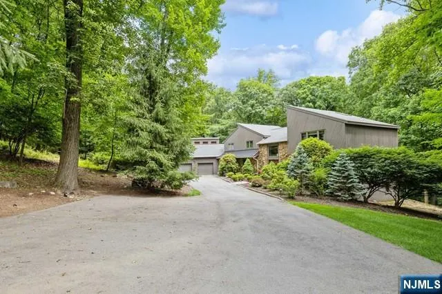 a view of a street with a building in the background