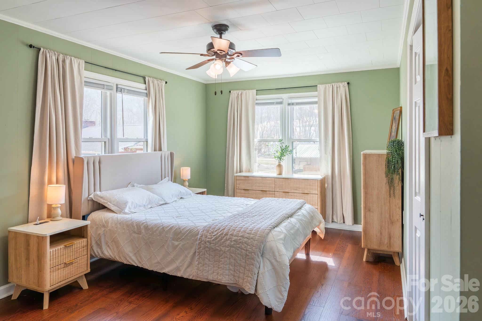 8573 Cruso Road Canton, NC 28716 - Photo 11 of 15 a bedroom with a bed and a window