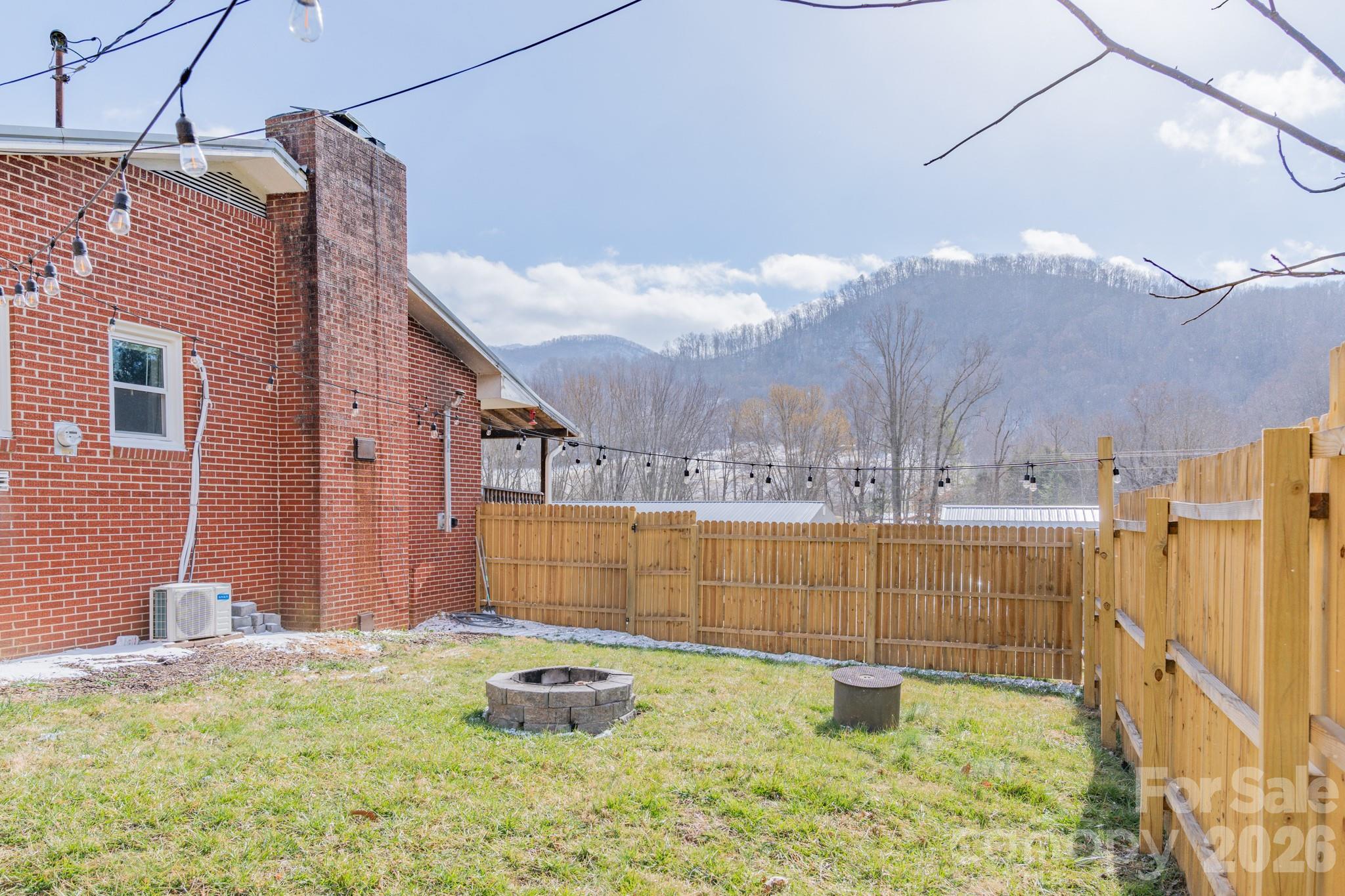 8573 Cruso Road Canton, NC 28716 - Photo 13 of 15 a bathroom with a sink and a mirror