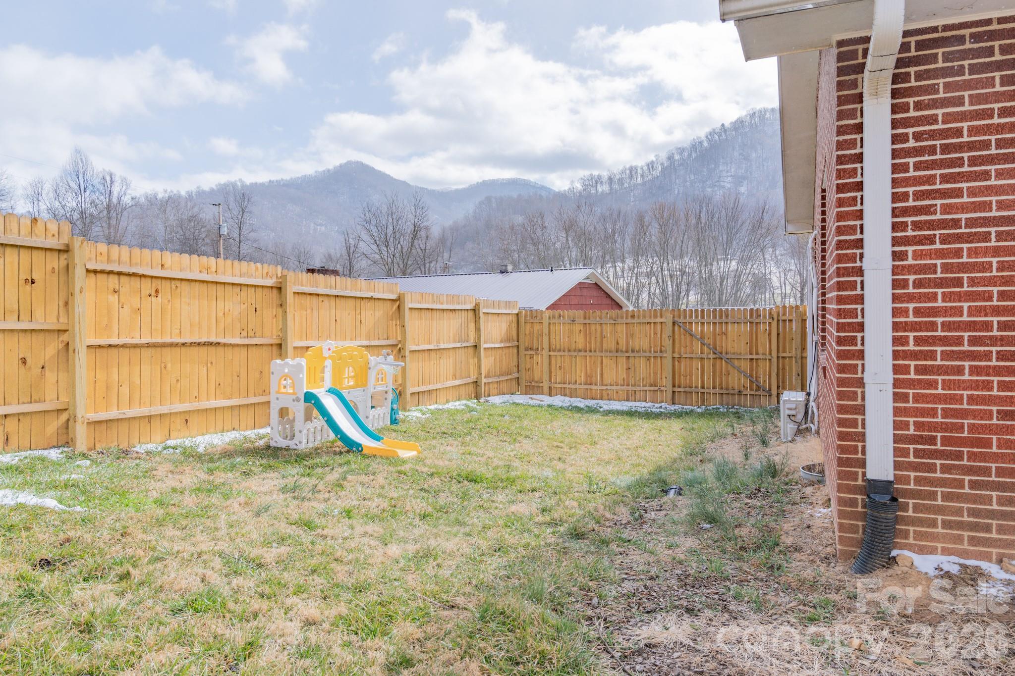8573 Cruso Road Canton, NC 28716 - Photo 15 of 15 a view of outdoor space with swimming pool and seating