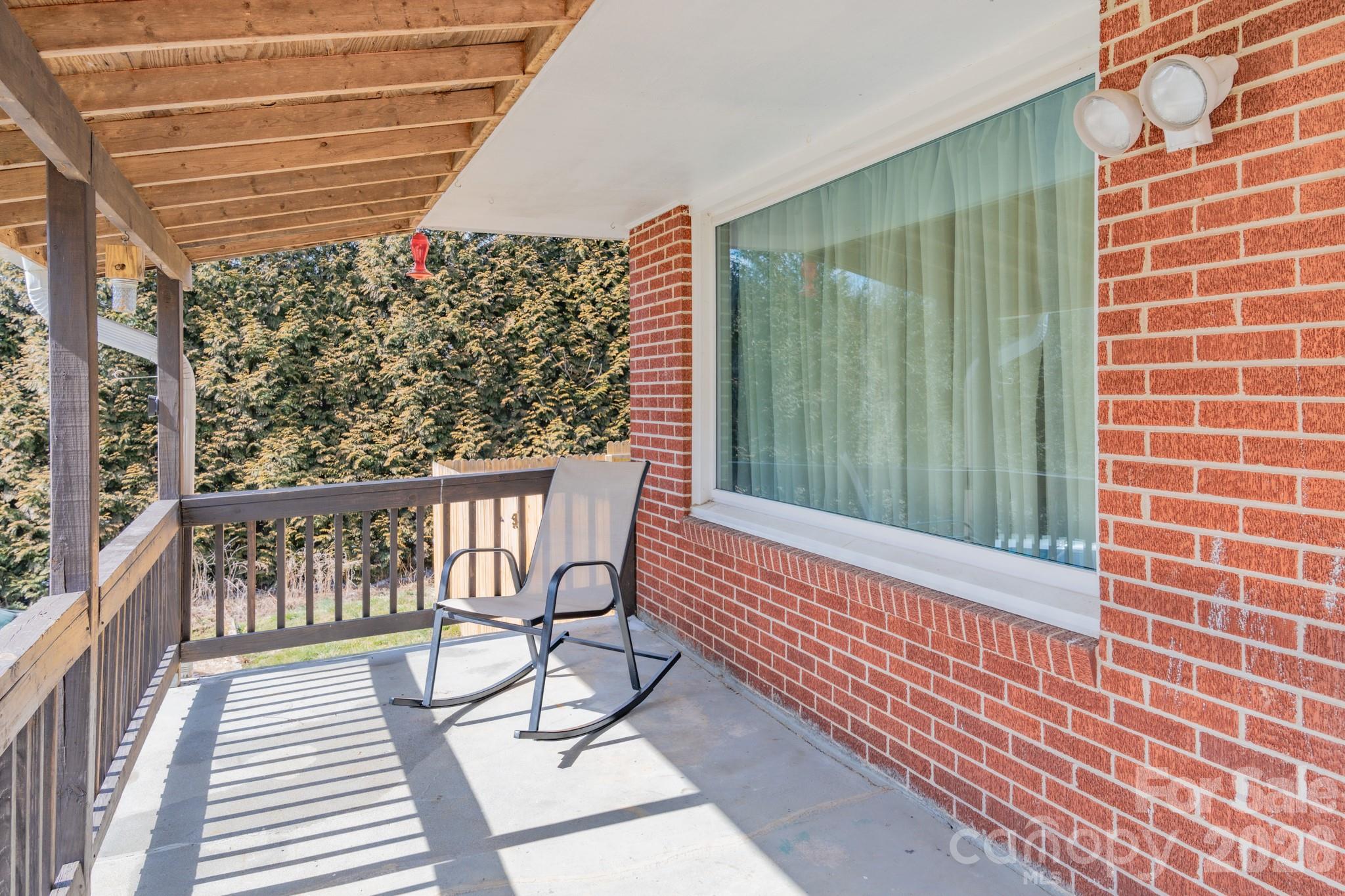 8573 Cruso Road Canton, NC 28716 - Photo 2 of 15 a view of a balcony with chairs