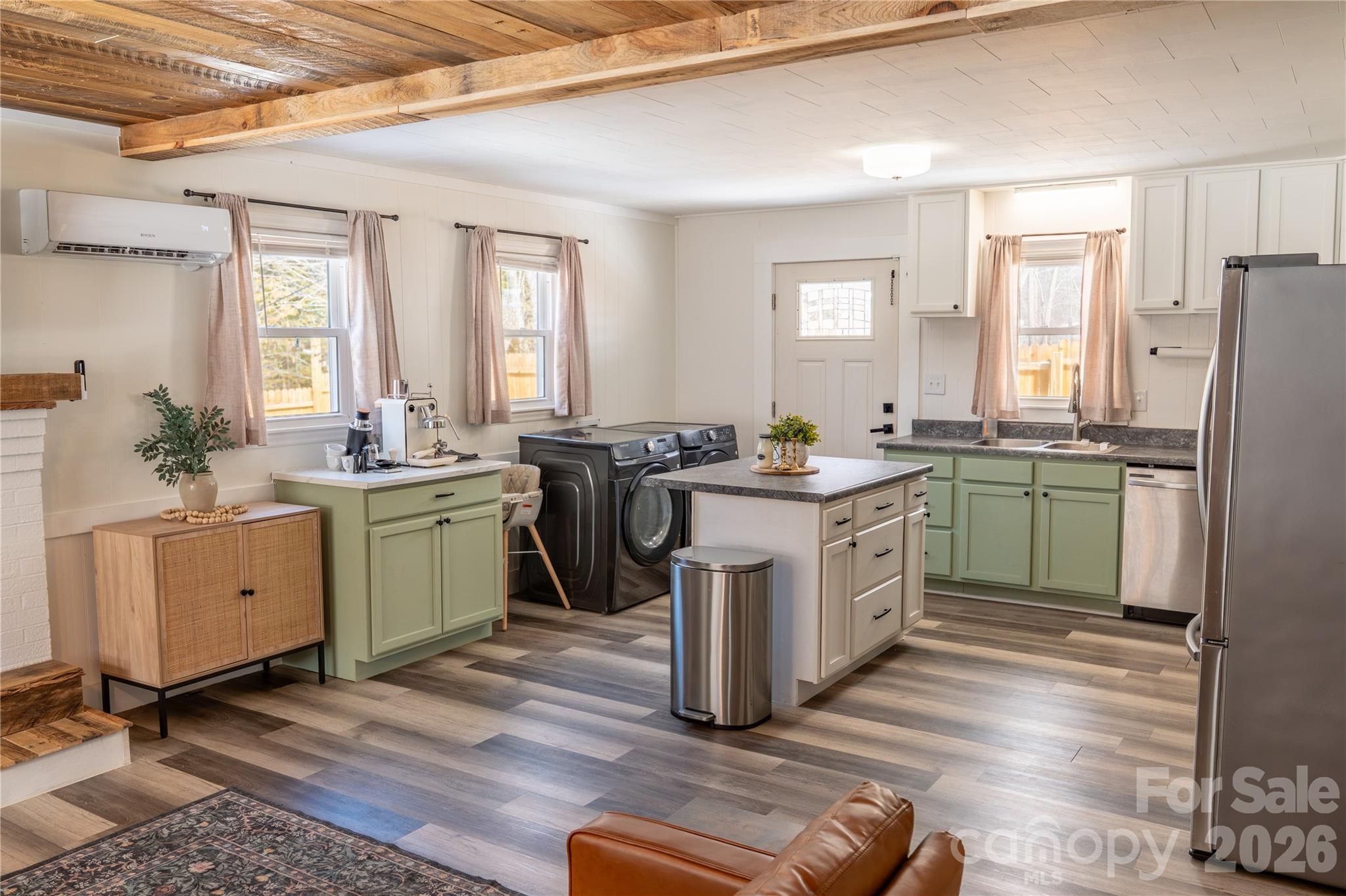 8573 Cruso Road Canton, NC 28716 - Photo 3 of 15 a kitchen with a sink stove and cabinets