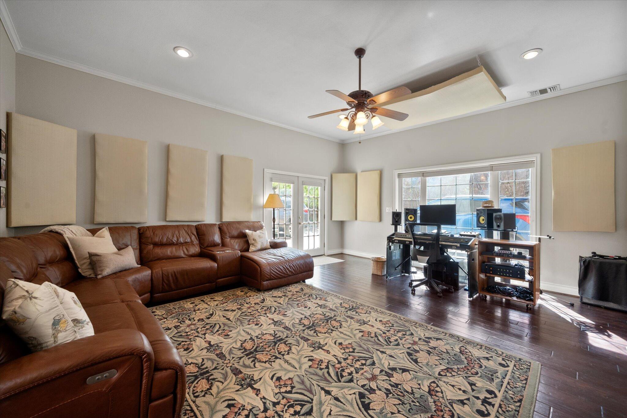 67 South Lake Shore Drive Ransom Canyon, TX 79366 - Photo 27 of 52 a living room with furniture a couch and wooden floor