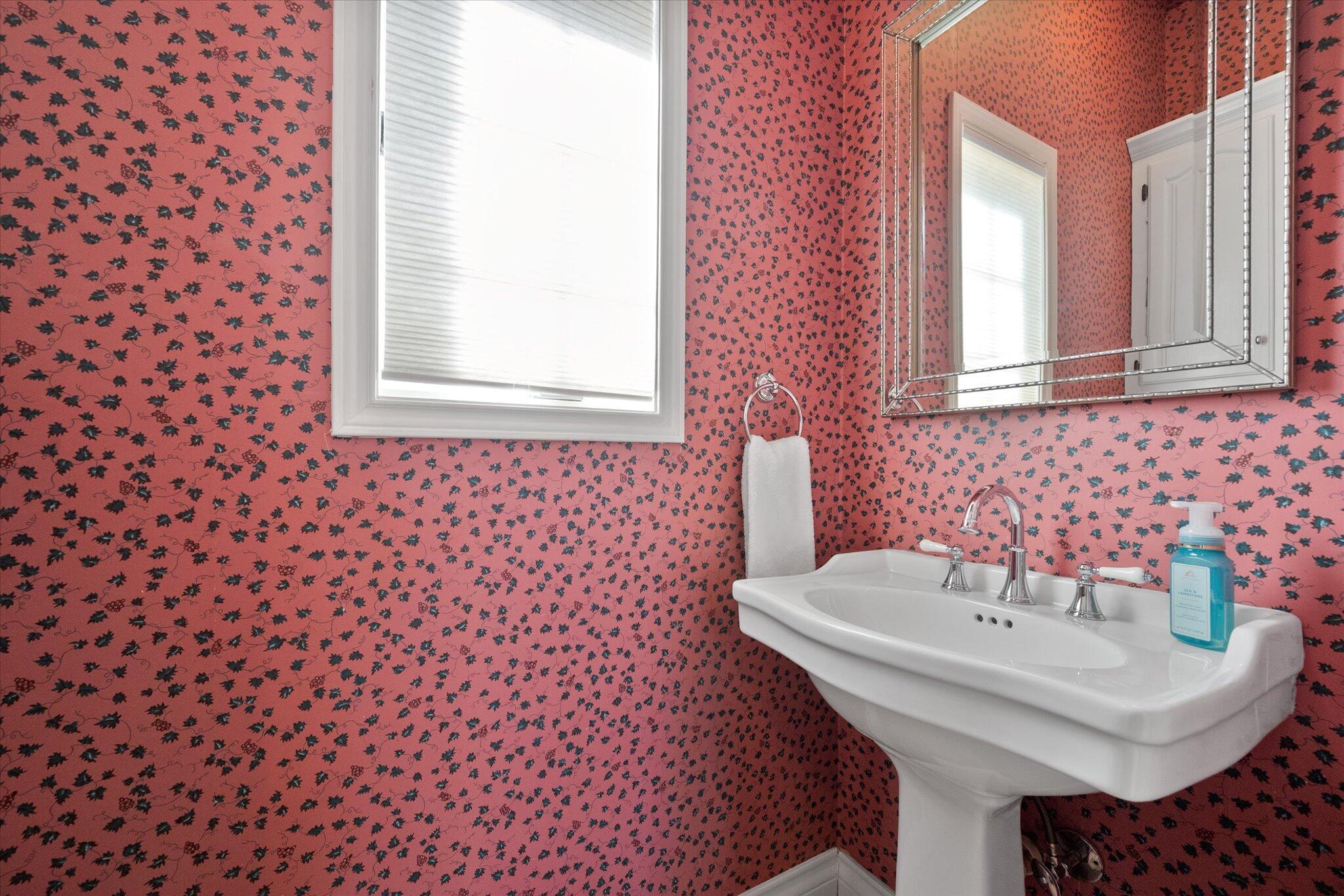 67 South Lake Shore Drive Ransom Canyon, TX 79366 - Photo 28 of 52 a bathroom with a sink and a mirror