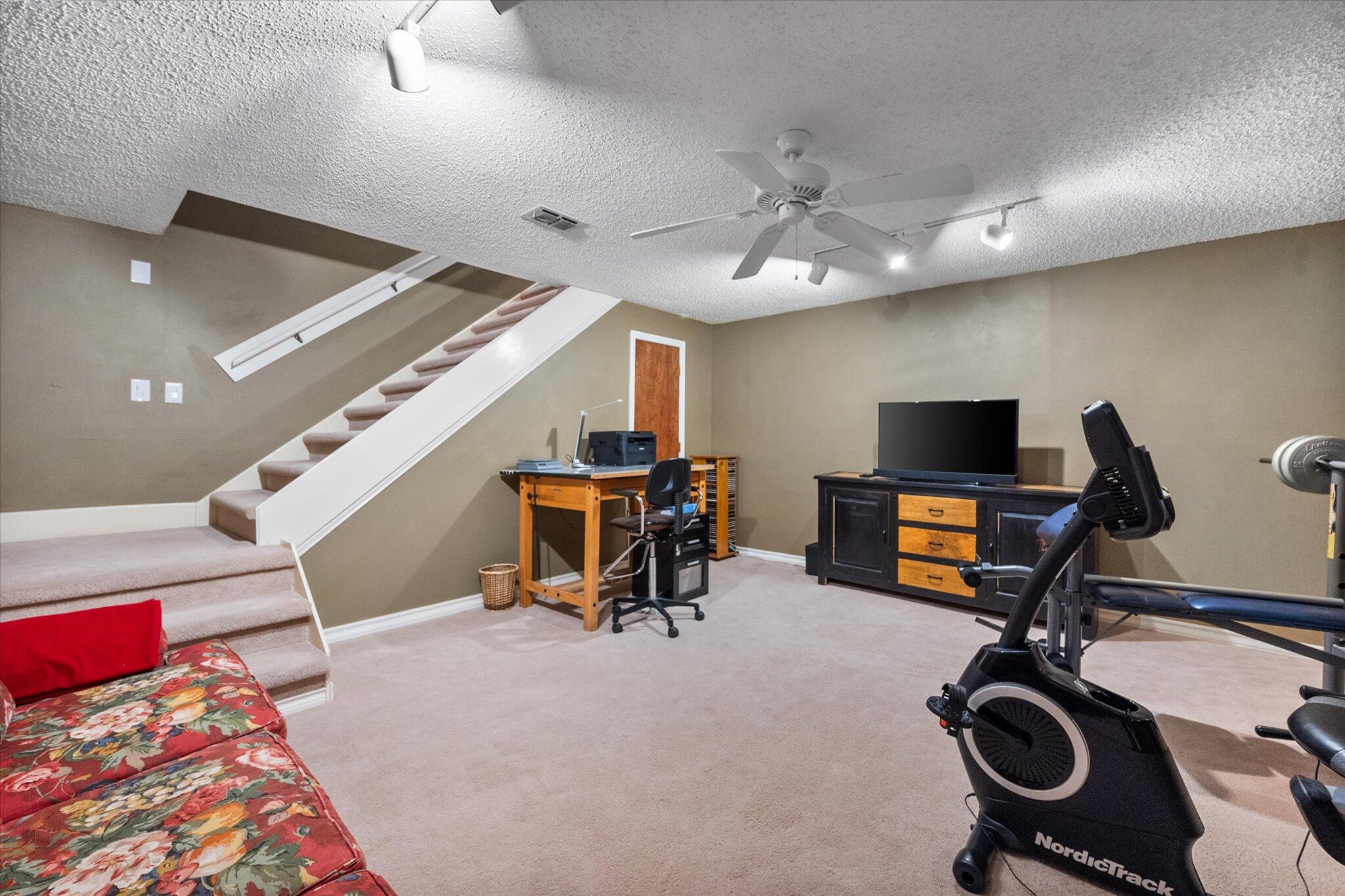67 South Lake Shore Drive Ransom Canyon, TX 79366 - Photo 31 of 52 a view of a room with gym equipment