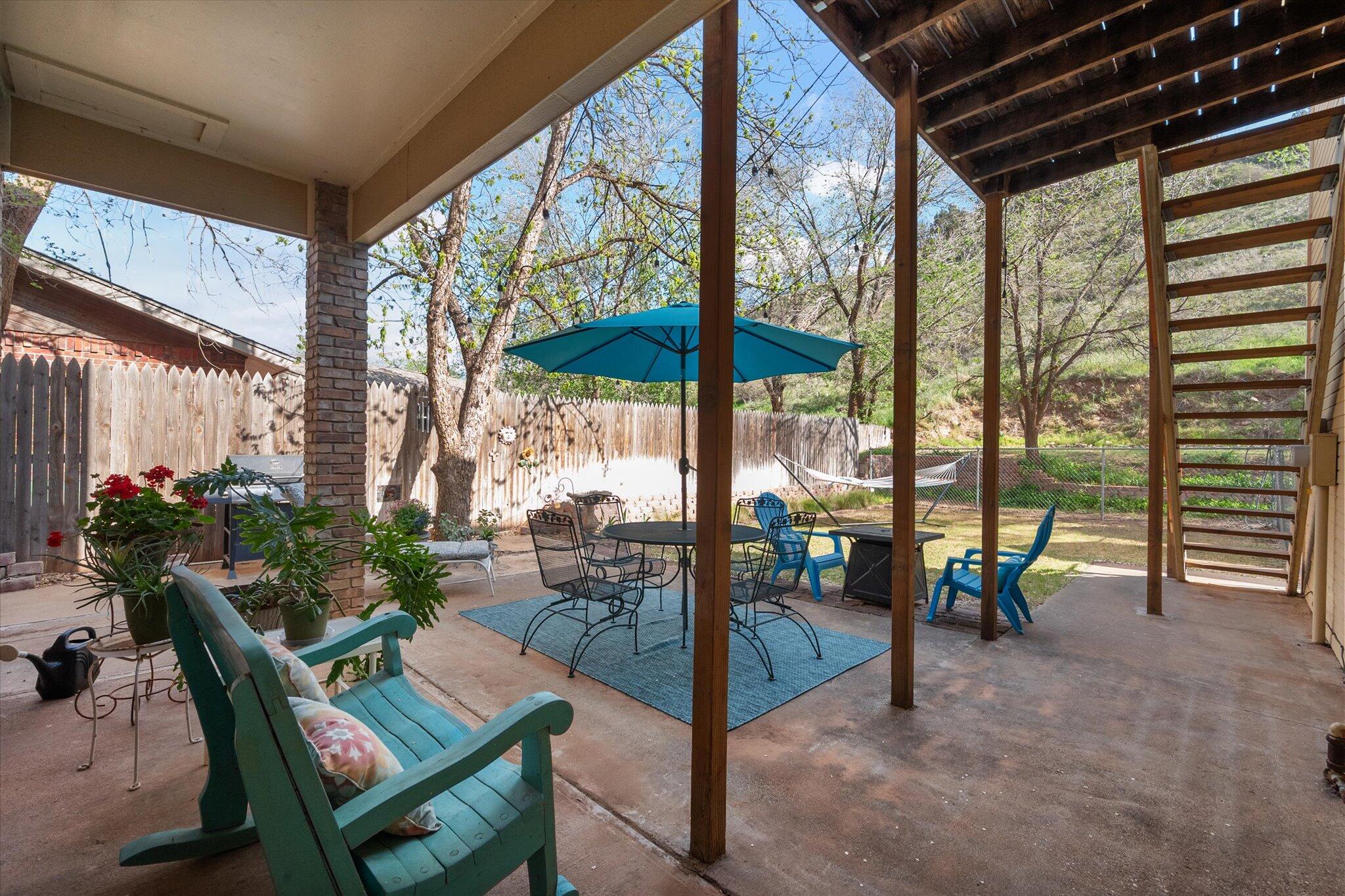 67 South Lake Shore Drive Ransom Canyon, TX 79366 - Photo 47 of 52 a view of a porch with furniture and a yard