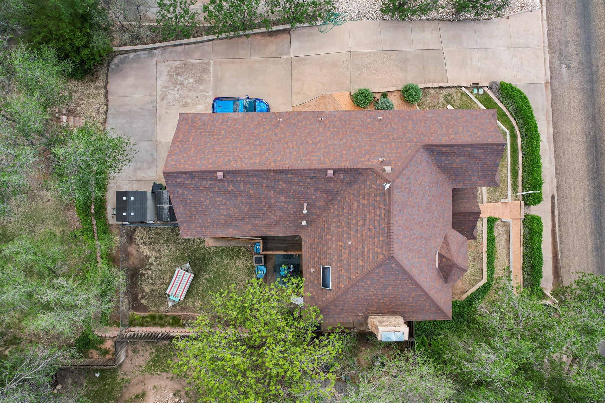 67 South Lake Shore Drive Ransom Canyon, TX 79366 - Photo 5 of 52 an aerial view of a house with a yard