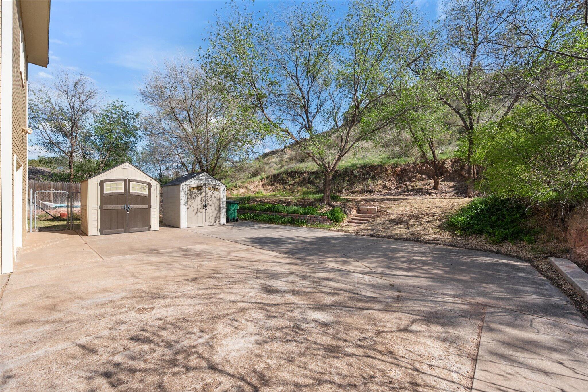 67 South Lake Shore Drive Ransom Canyon, TX 79366 - Photo 52 of 52 a front view of a house with a yard and garage