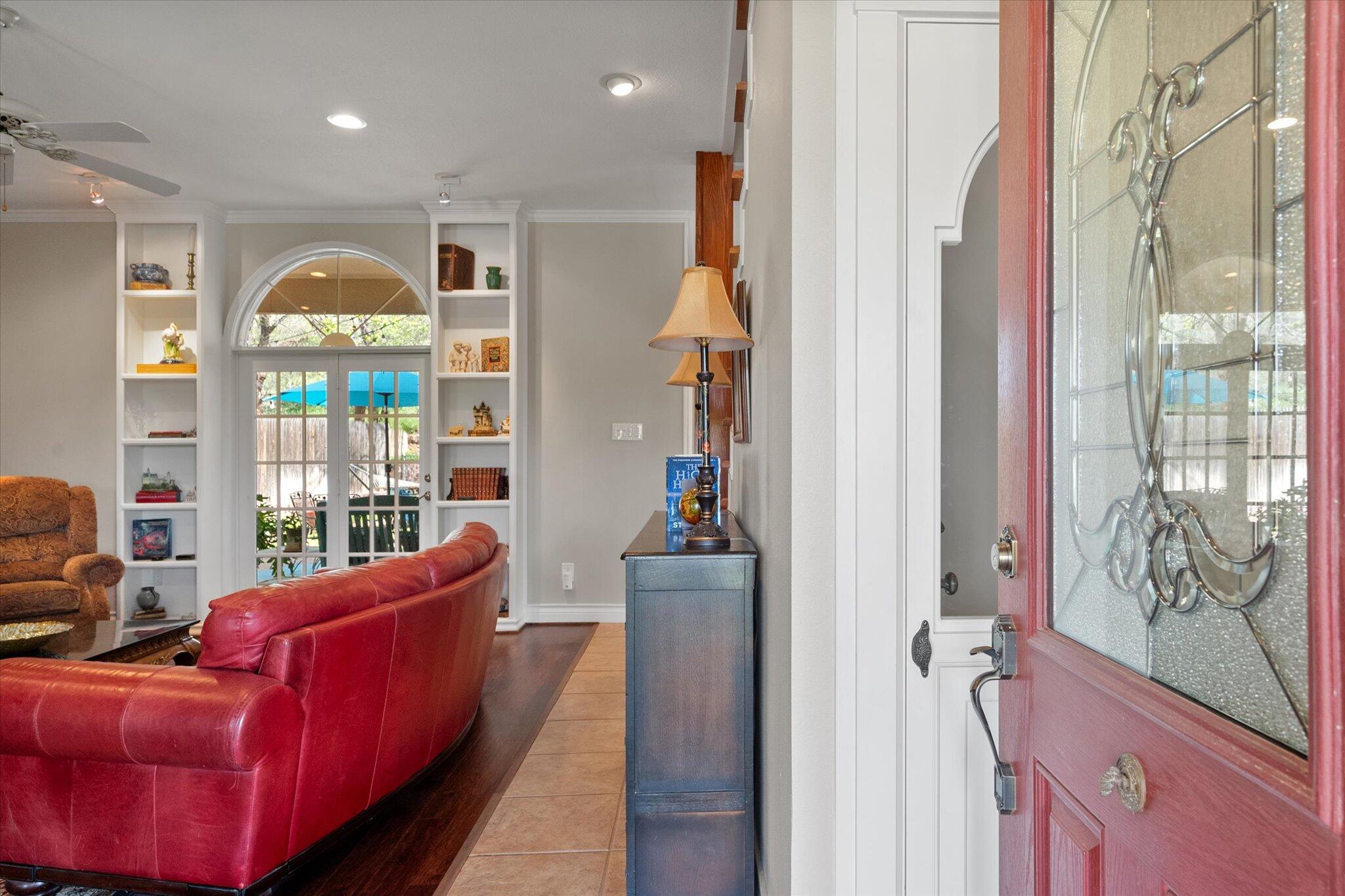 67 South Lake Shore Drive Ransom Canyon, TX 79366 - Photo 8 of 52 a living room with furniture a chandelier and a window