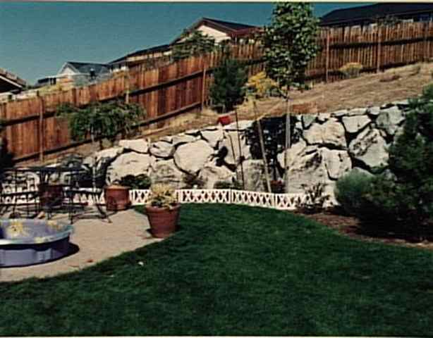 871 University Ridge Drive Reno, NV 89512 - Photo 1 of 7 a view of a garden with patio