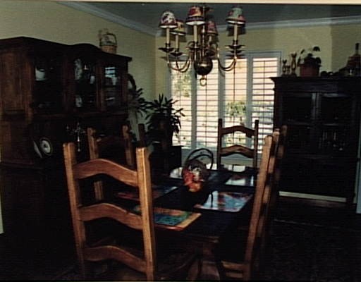 871 University Ridge Drive Reno, NV 89512 - Photo 6 of 7 a kitchen area with table and chairs