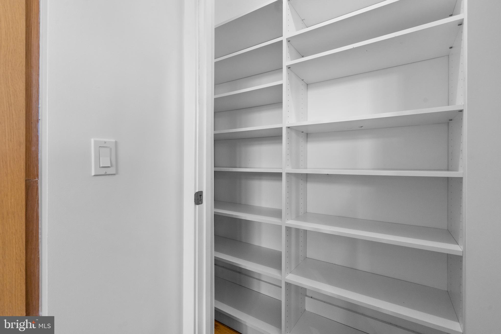 1324 E Street Southeast, Unit 201 Washington, DC 20003 - Photo 11 of 47 a view of walk in closet with empty racks