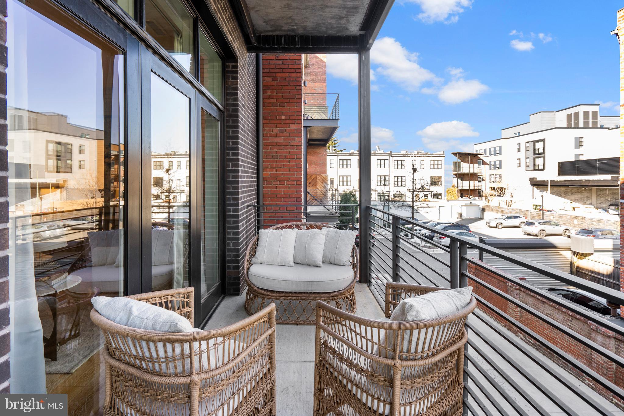 1324 E Street Southeast, Unit 201 Washington, DC 20003 - Photo 13 of 47 a patio with patio table and chairs