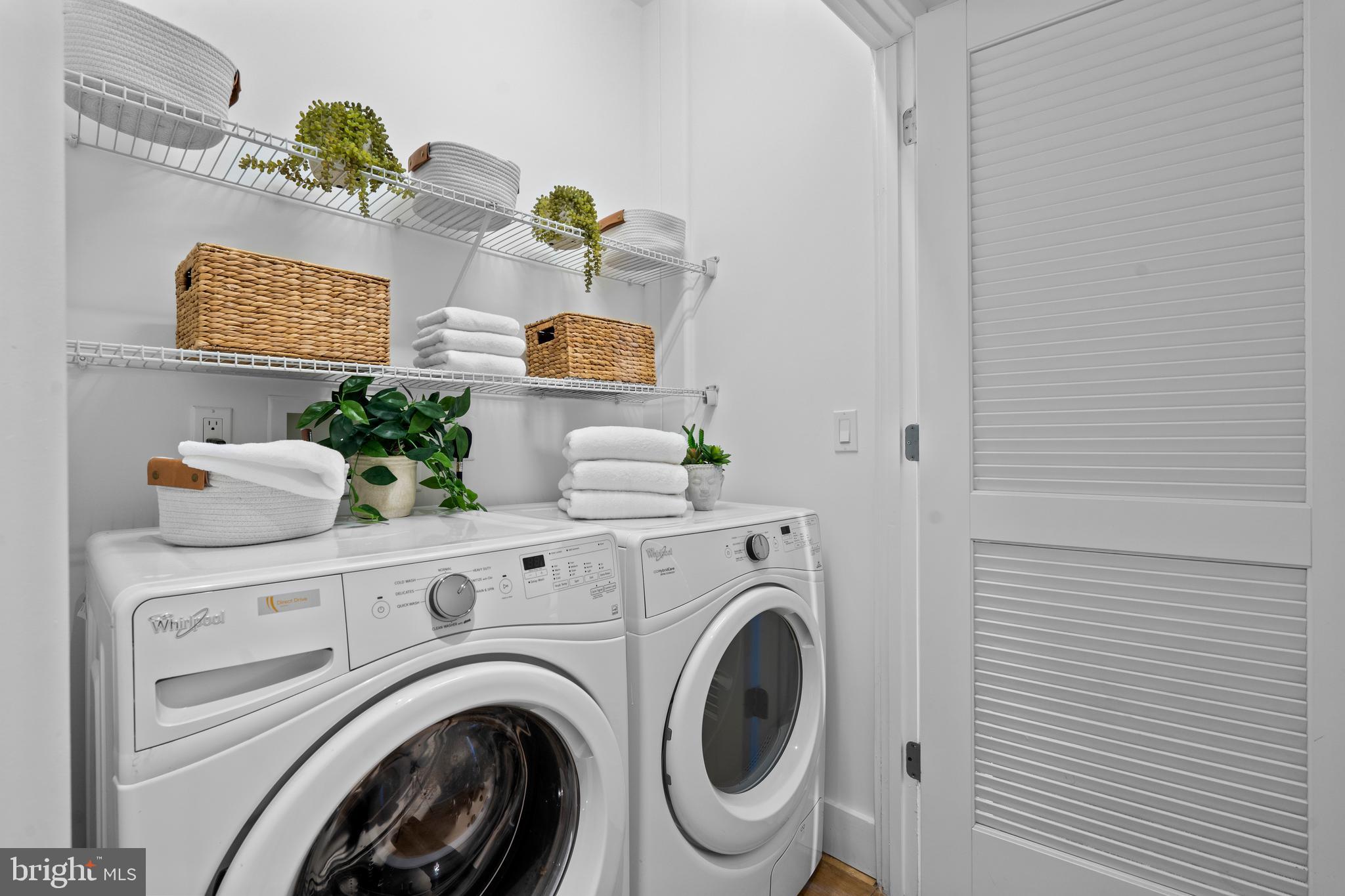 1324 E Street Southeast, Unit 201 Washington, DC 20003 - Photo 37 of 47 a utility room with dryer and washer