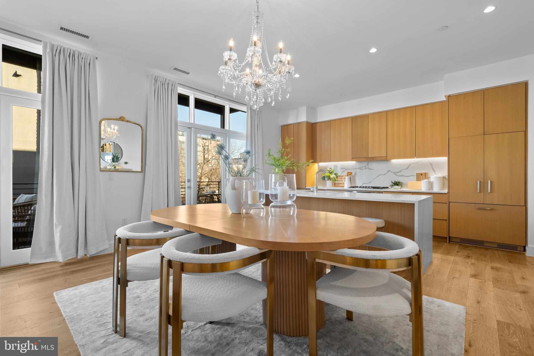 1324 E Street Southeast, Unit 201 Washington, DC 20003 - Photo 4 of 47 a kitchen with a table and chairs