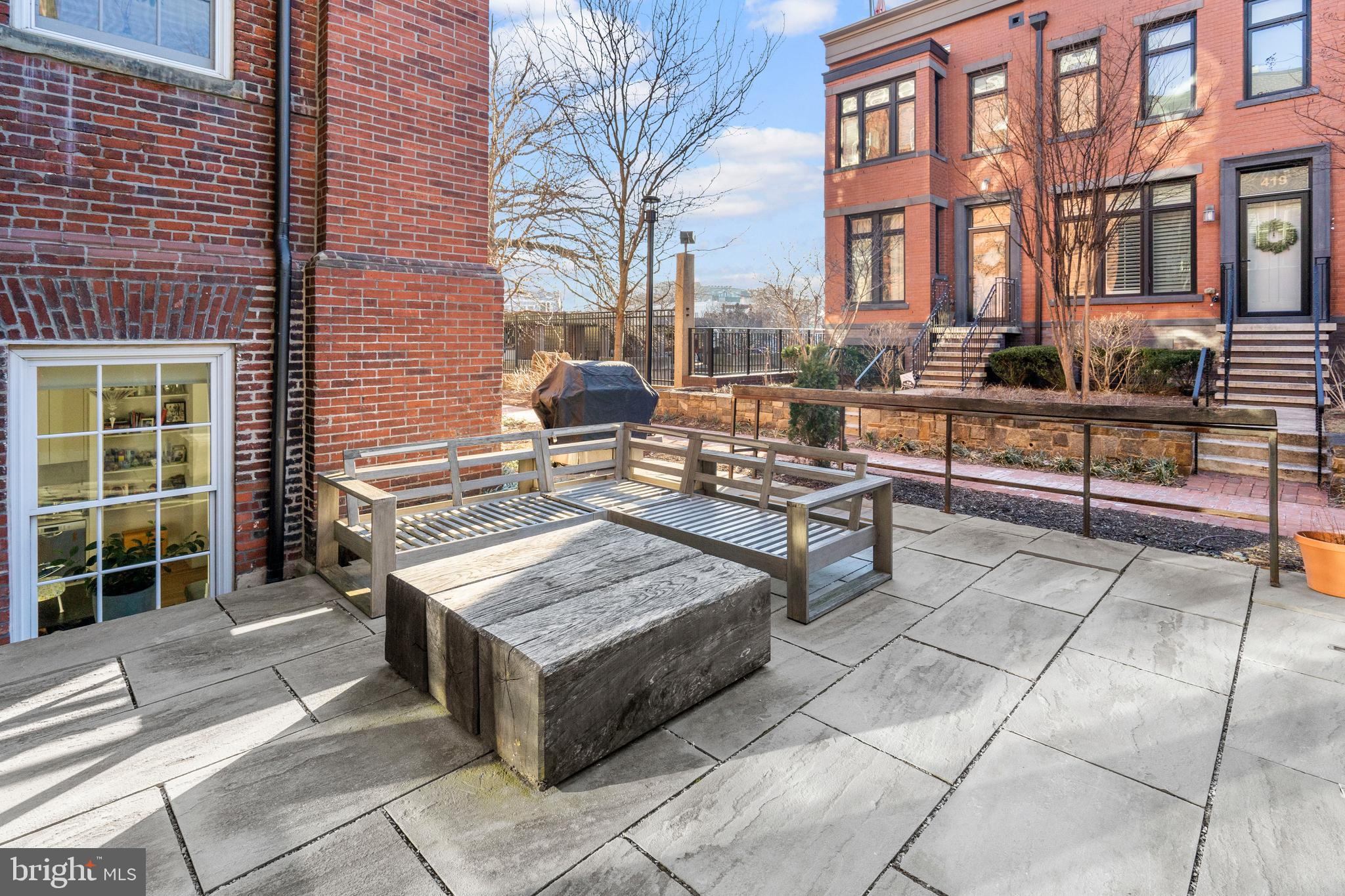 1324 E Street Southeast, Unit 201 Washington, DC 20003 - Photo 43 of 47 a view of a building with outdoor seating