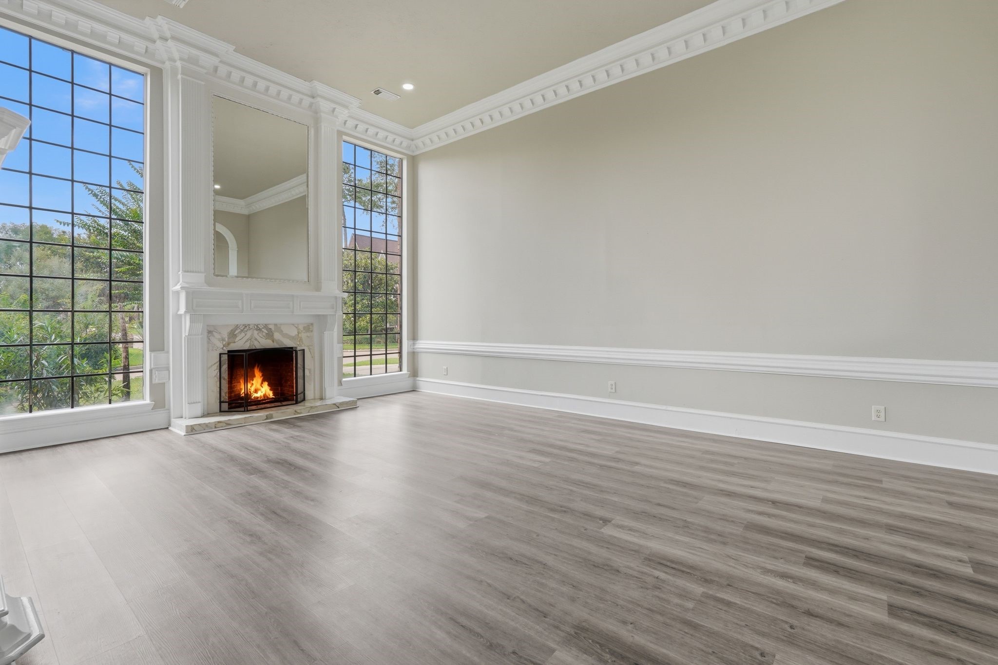 7611 Naremore Drive Spring, TX 77379 - Photo 5 of 48 Grand Parlour with a show stopping fireplace!