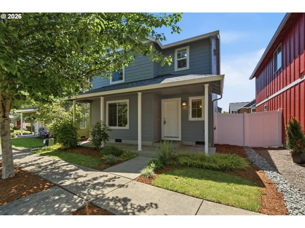 front view of a house with a yard