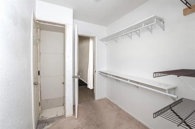 a view of a walk in closet