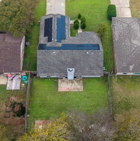 a view of a garden with a fountain