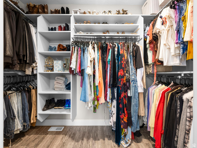 7 Sterling Loop Vineyard, UT 84059 - Photo 24 of 43 Custom closet system featuring wood-finish flooring