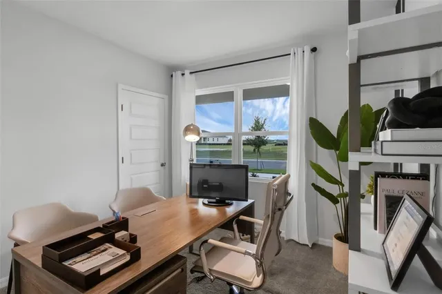 a room with furniture and a window