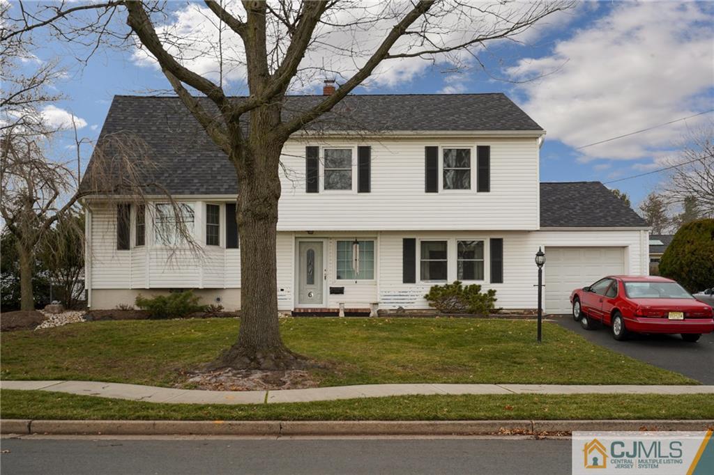6 Meyer Road Edison, NJ 08817 - Photo 1 of 32 a front view of a house with a yard