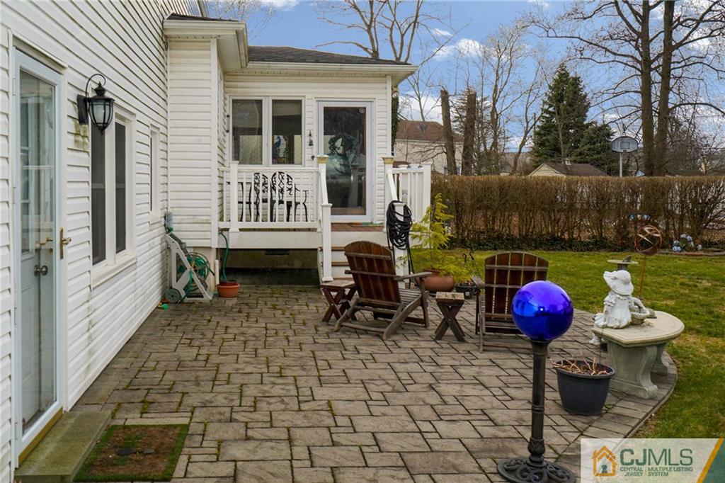 6 Meyer Road Edison, NJ 08817 - Photo 24 of 32 a front view of a house with outdoor seating space