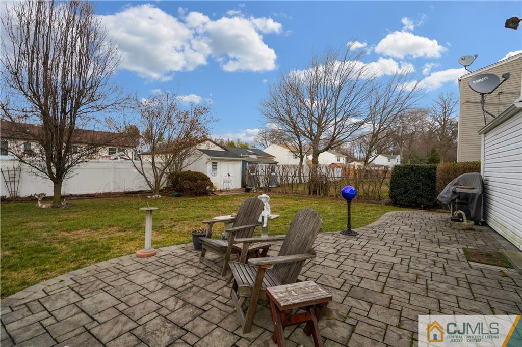 6 Meyer Road Edison, NJ 08817 - Photo 26 of 32 a view of a house with backyard and sitting area