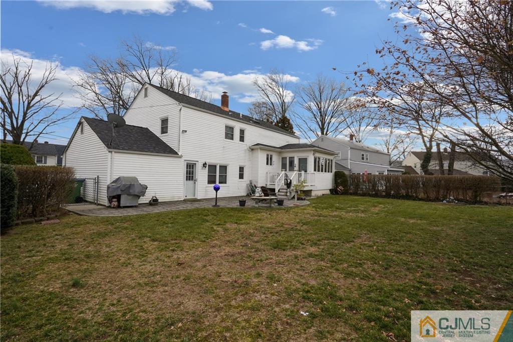 6 Meyer Road Edison, NJ 08817 - Photo 28 of 32 a view of a big house with a yard
