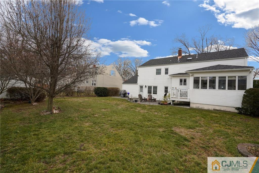 6 Meyer Road Edison, NJ 08817 - Photo 29 of 32 a view of a house with a yard