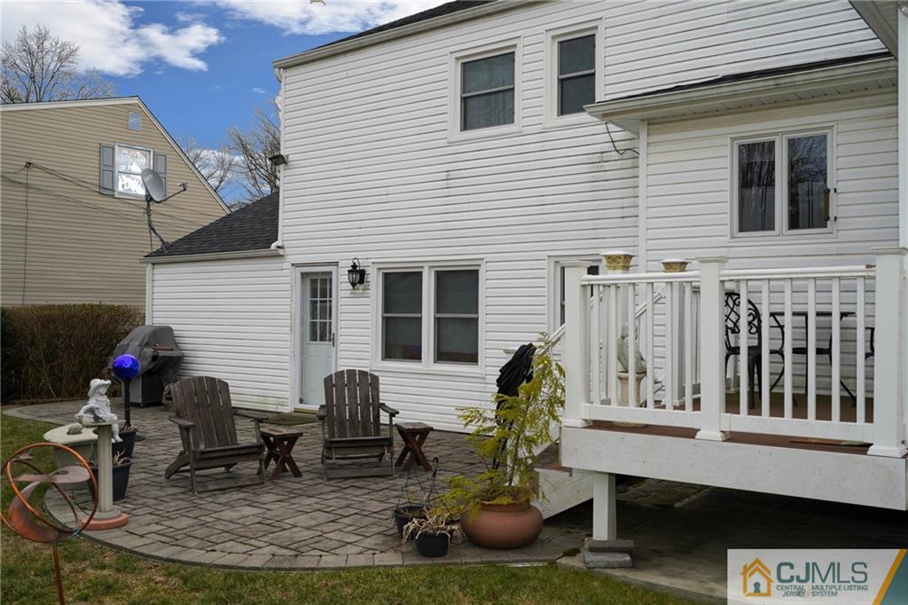 6 Meyer Road Edison, NJ 08817 - Photo 30 of 32 a view of house with chair and tables