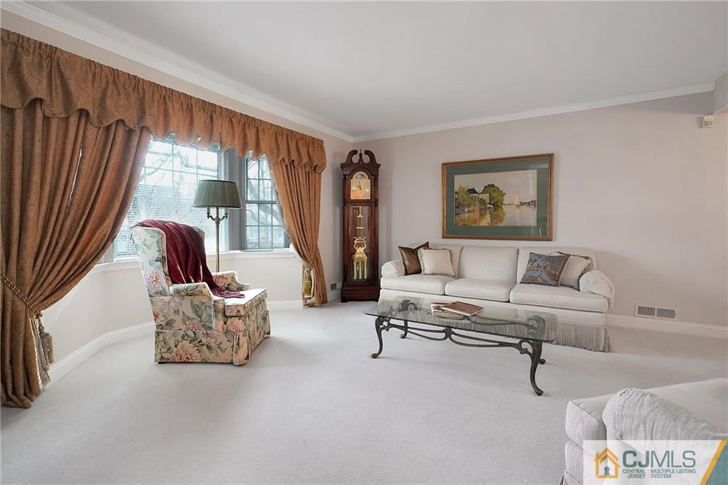 6 Meyer Road Edison, NJ 08817 - Photo 6 of 32 a living room with furniture and a large window