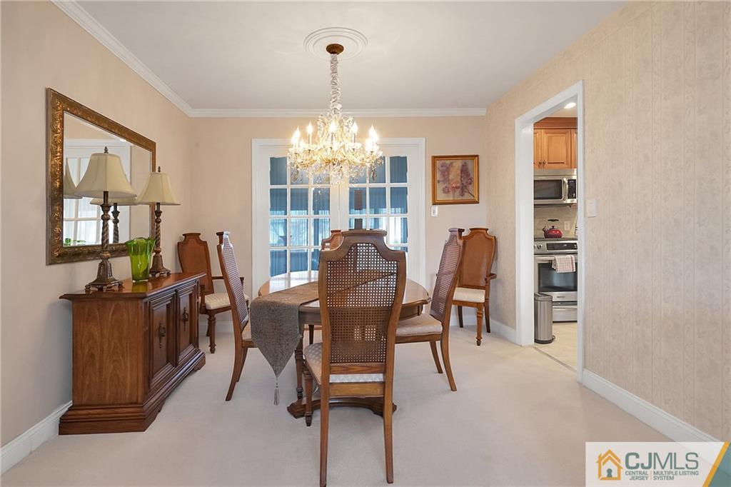 6 Meyer Road Edison, NJ 08817 - Photo 10 of 32 a dining room with furniture and window