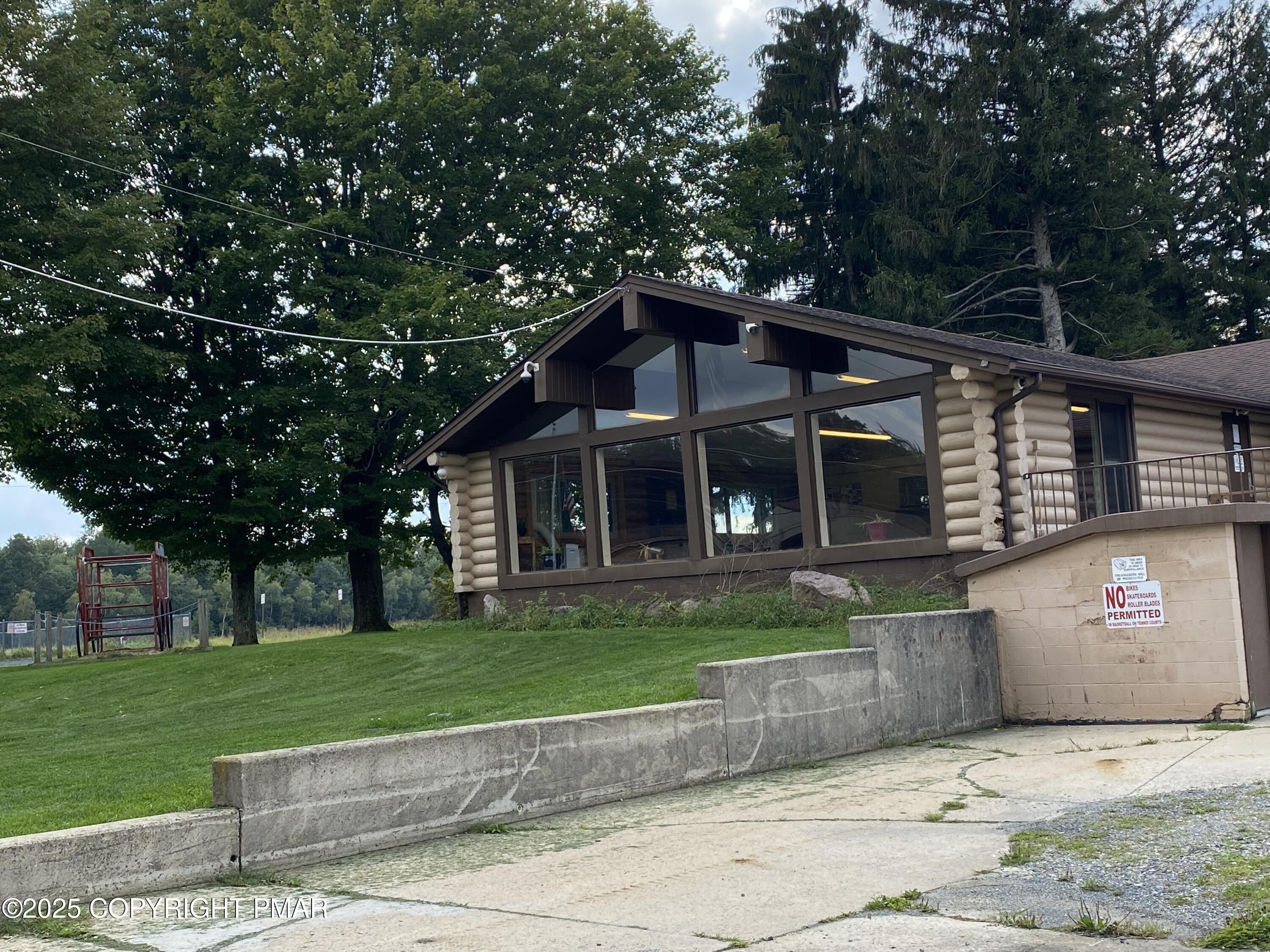 98 East Old Stage Road Albrightsville, PA 18210 - Photo 5 of 9 a front view of a house with a yard