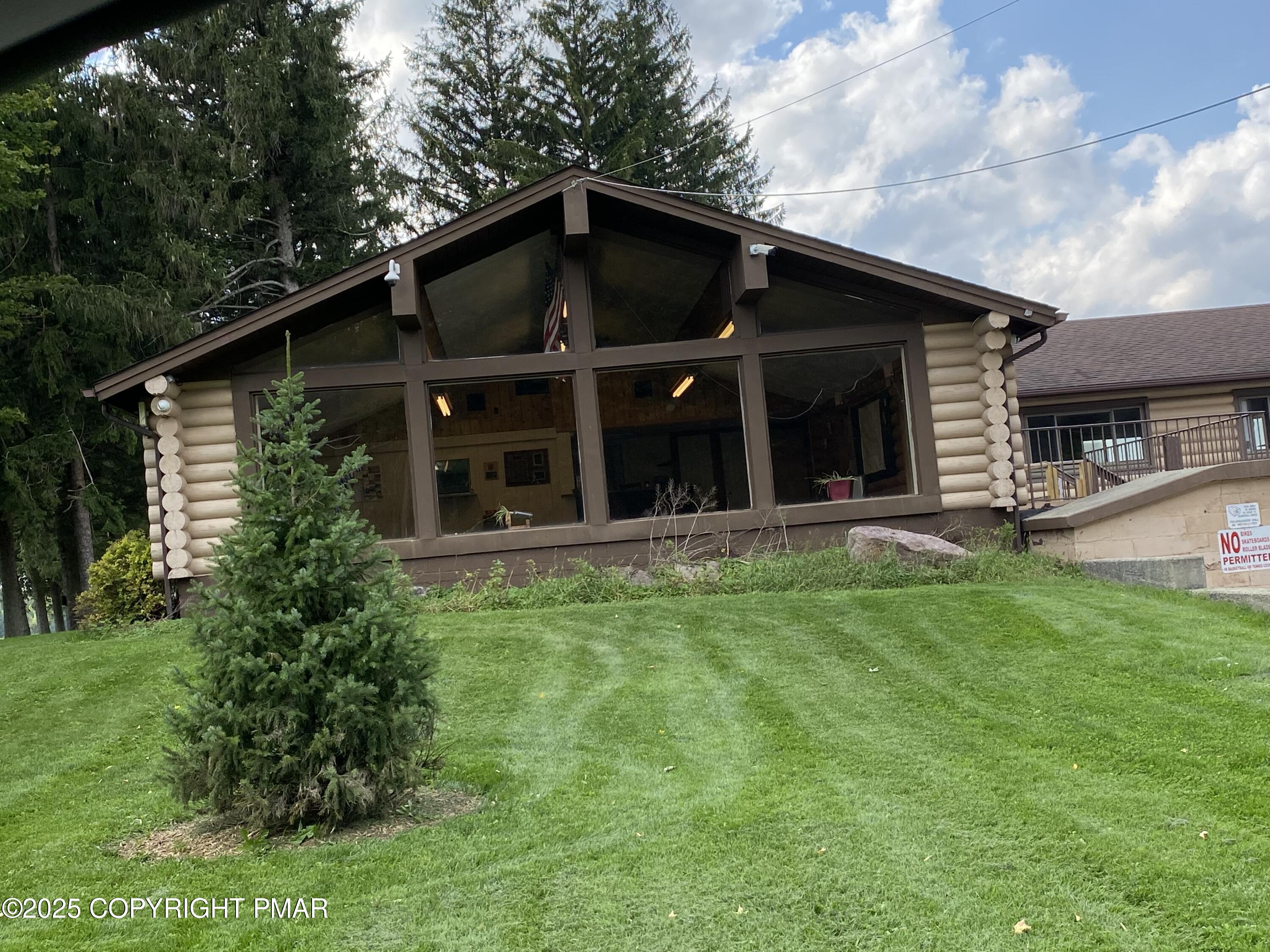 98 East Old Stage Road Albrightsville, PA 18210 - Photo 6 of 9 a view of a house with yard and porch