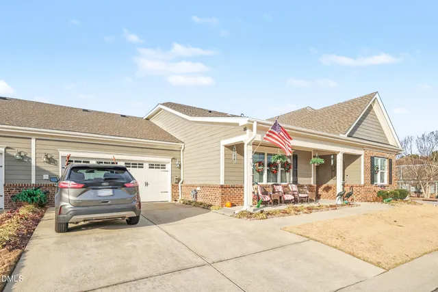 a car parked in front of a house