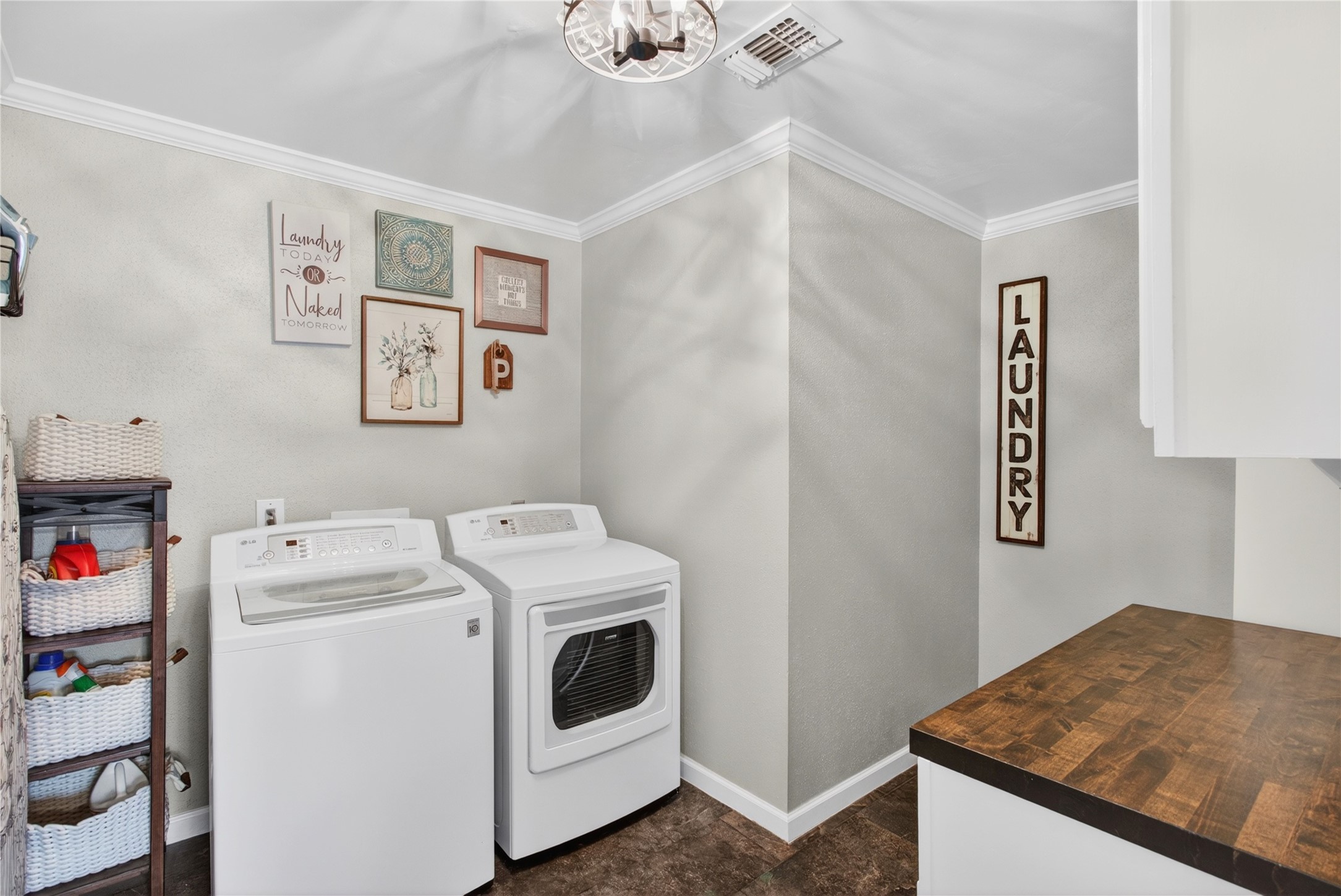 20214 Woodsboro Court Spring, TX 77388 - Photo 22 of 50 Laundry Room w/space for extra Refrigerator! Recently Updated Wood Butcher Block Counter! Connects to Extra Room and Garage! Recently Painted Interior! Luxury Vinyl Plank throughout 1st Floor!