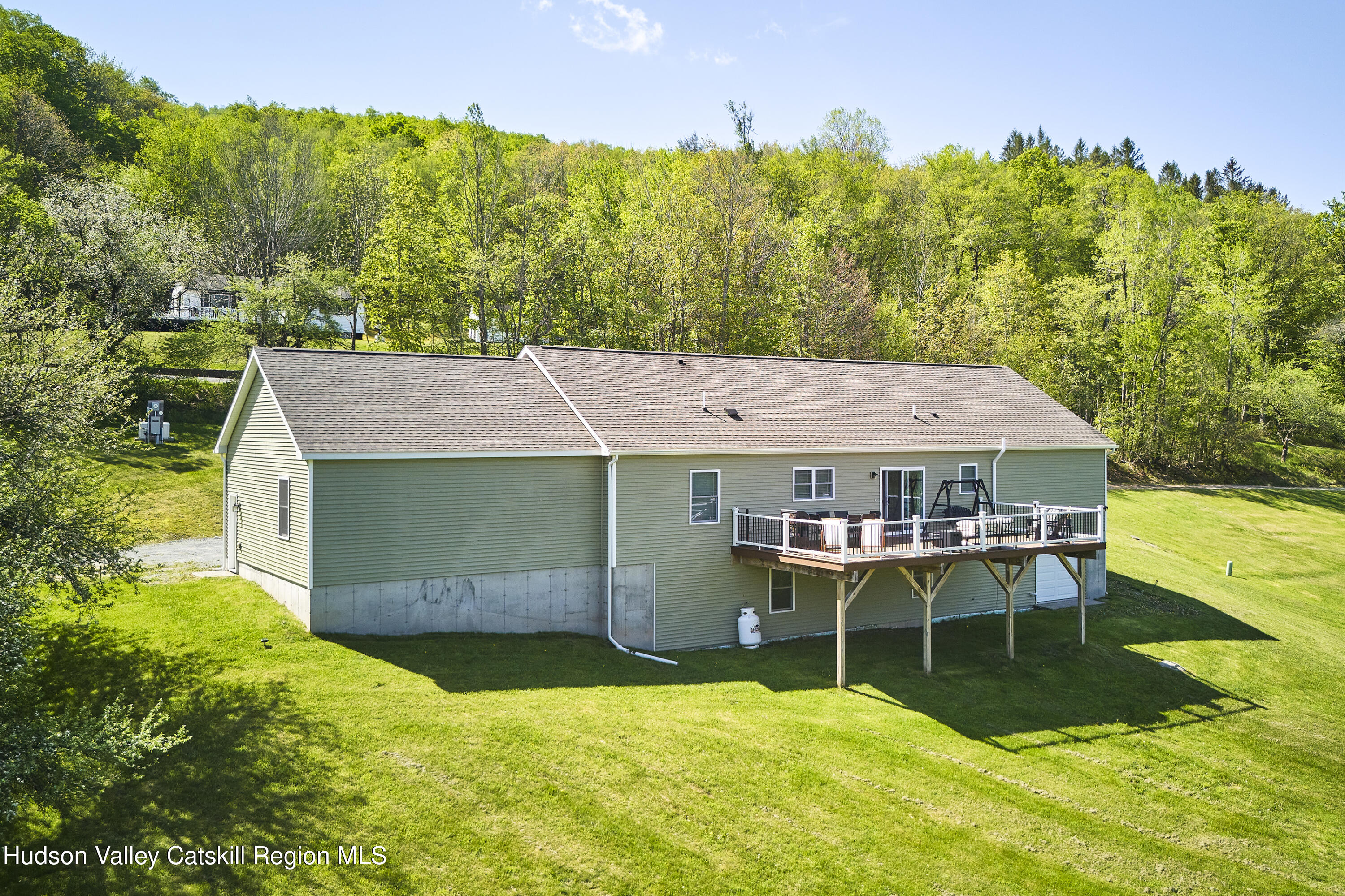 55 Hunter Road Parksville, NY 12768 - Photo 32 of 35 a view of a house with pool porch and chairs