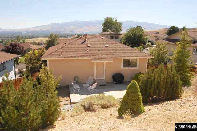 625 Talus Way Reno, NV 89503 - Photo 12 of 13 a view of a house with a yard