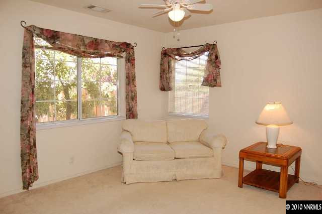 625 Talus Way Reno, NV 89503 - Photo 4 of 13 a living room with furniture and a window