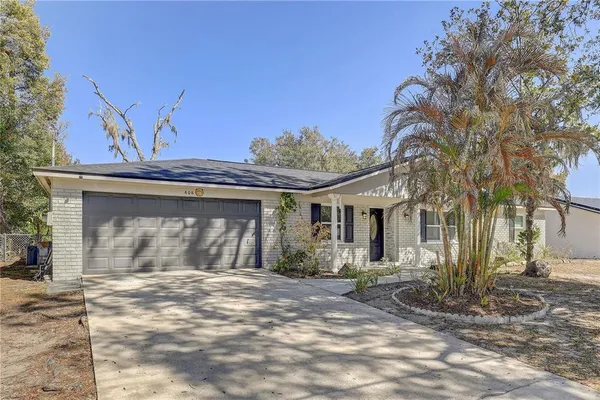a view of a yard in front of a house