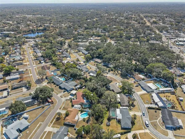 an aerial view of residential house with outdoor space