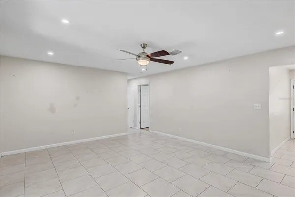 a kitchen with stainless steel appliances granite countertop a refrigerator sink and cabinets