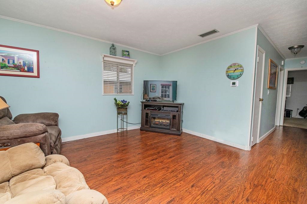 202 Argonaut Road St. Augustine, FL 32086 - Photo 7 of 33 a living room with furniture and a wooden floor
