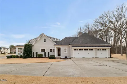 a front view of a house with a glass door
