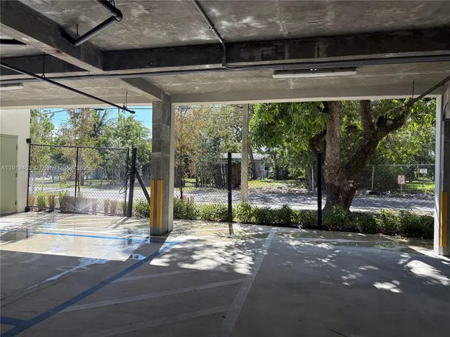 a view of backyard with green space