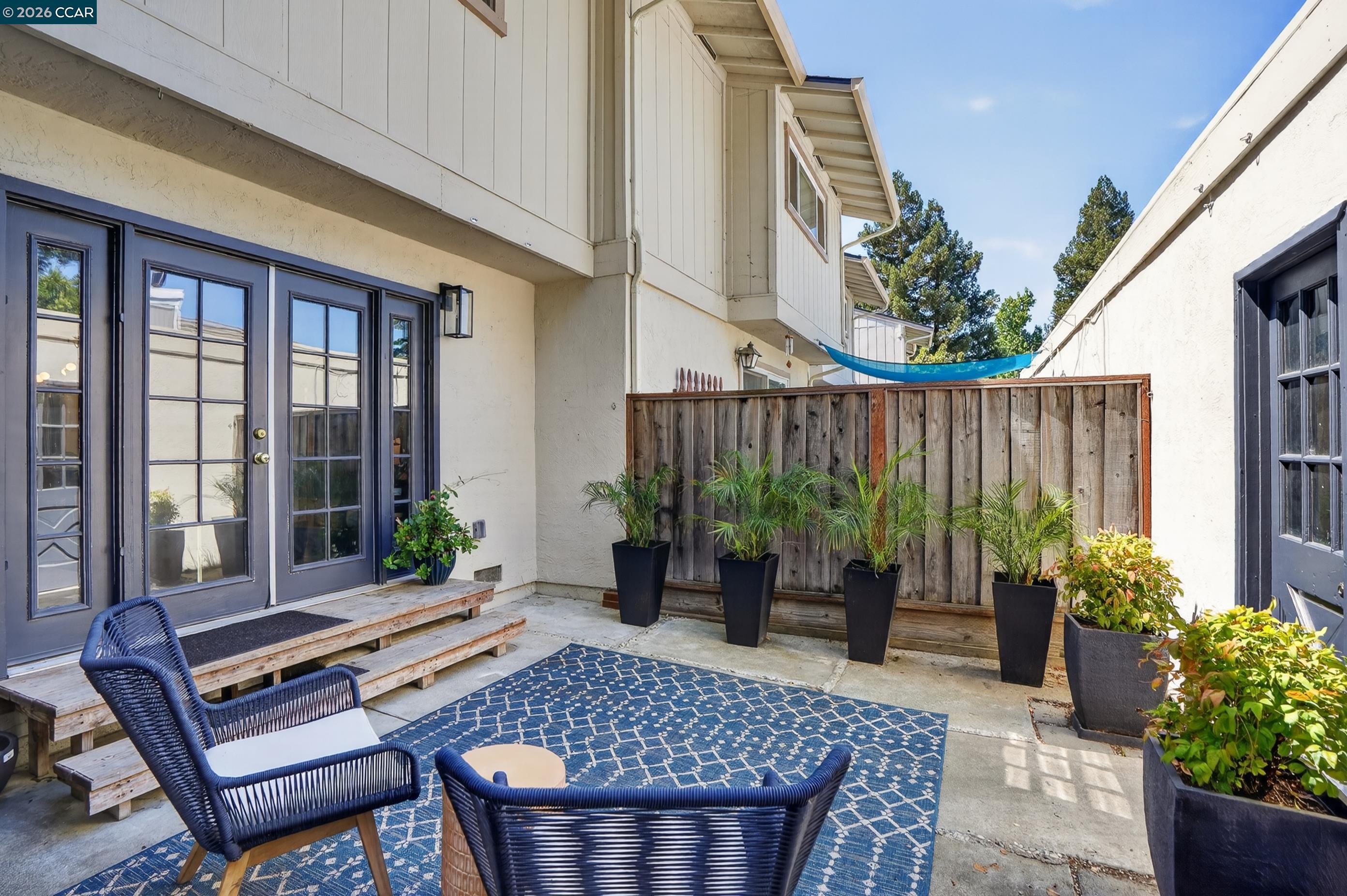 1812 Wildbrook Court, Unit C Concord, CA 94521 - Photo 30 of 35 a backyard of a house with seating space