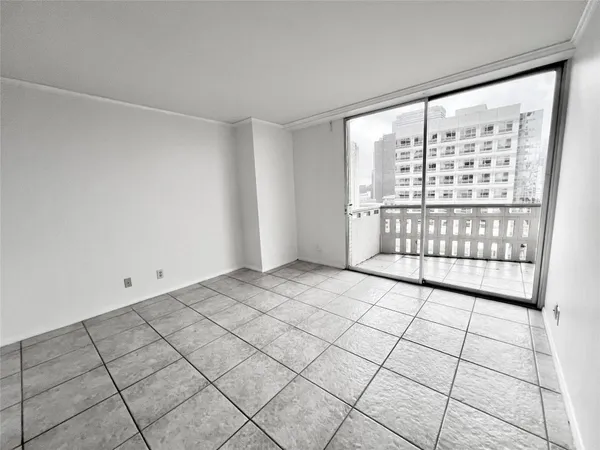 a view of an empty room and window